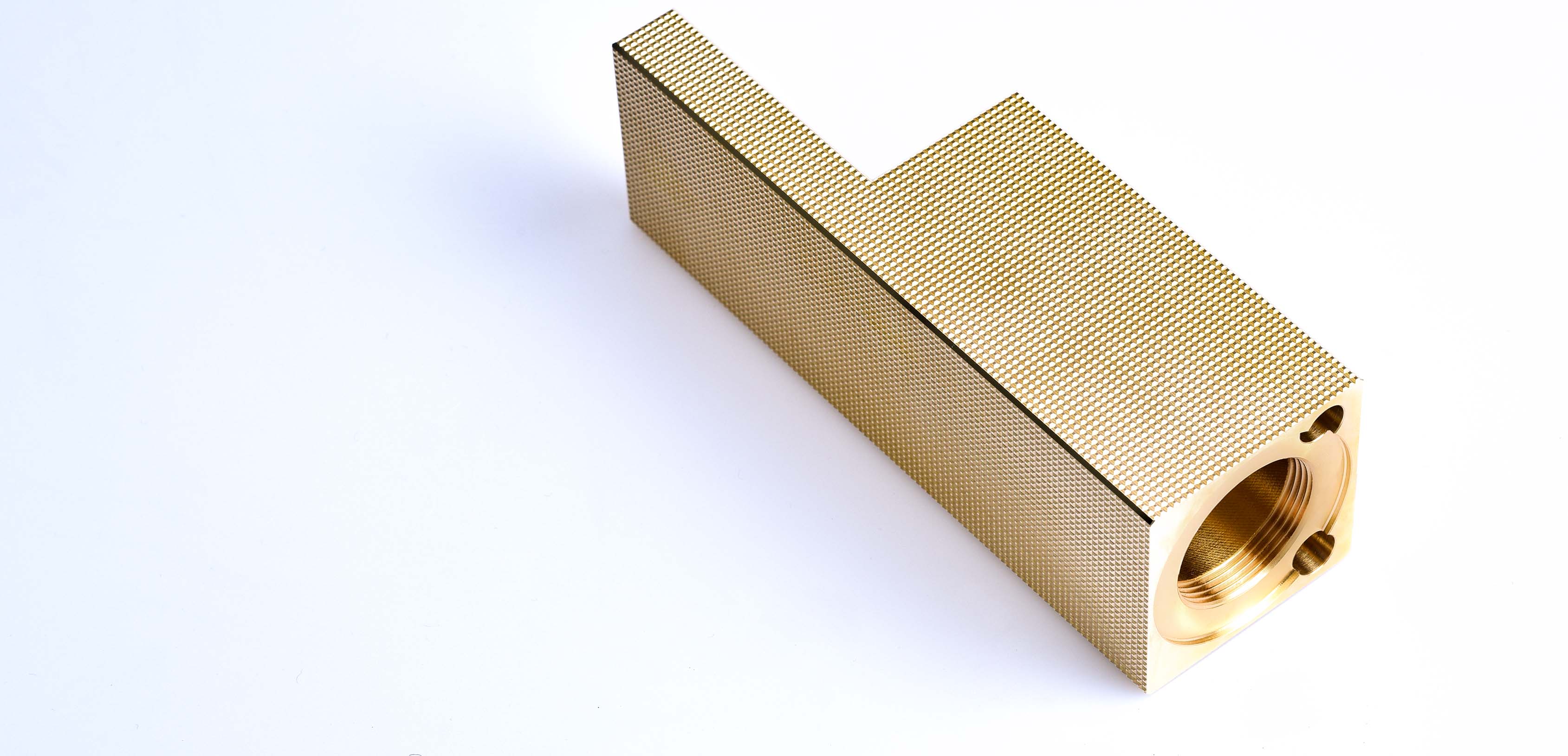 Ein 5-achs simultangefrästes Werkstück aus messing von Grohe Technology